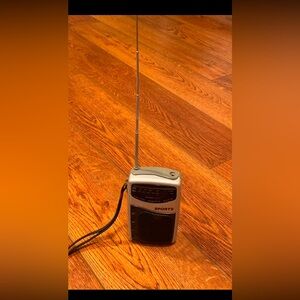 Vintage Street Beats: Sports AM/FM Transistor Handheld Radio